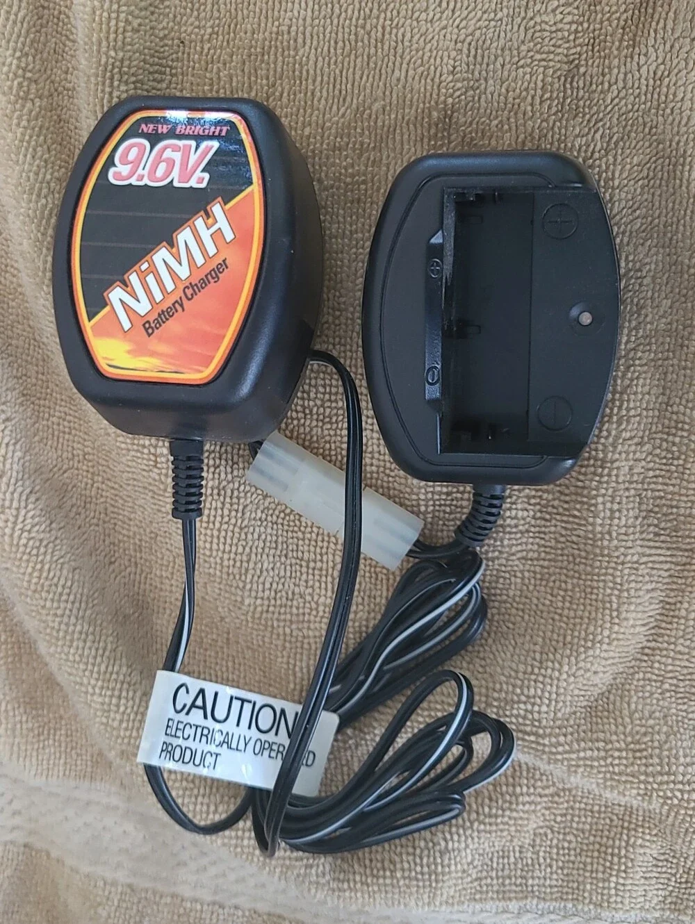 New Bright 9.6V NiMH Battery Charger and PacksNew Bright 9.6 Volts 1200 Bundle